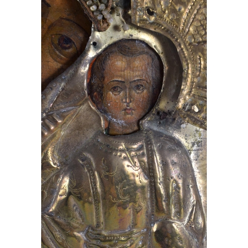 580 - AN ANTIQUE RUSSIAN ICON. 30 cm x 28 cm.