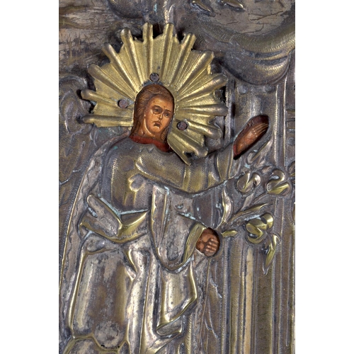 581 - AN ANTIQUE RUSSIAN ICON. 30 cm x 26 cm.