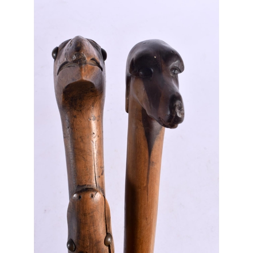 583 - TWO ANTIQUE FOLK ART WALKING CANES. 90 cm long. (2)