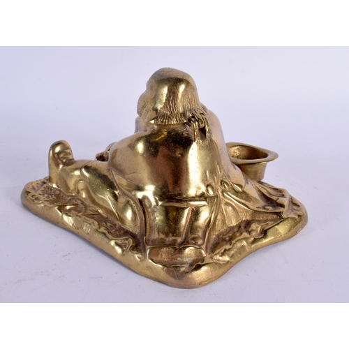 594 - A 1920S EUROPEAN BRASS INKWELL modelled as famous Surrey legend John Nicholson. 15 cm x 13 cm.