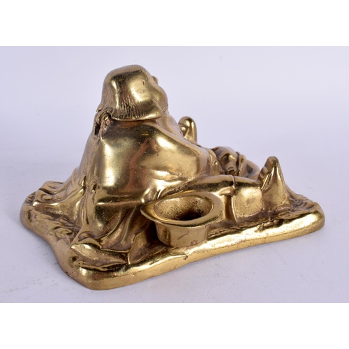 594 - A 1920S EUROPEAN BRASS INKWELL modelled as famous Surrey legend John Nicholson. 15 cm x 13 cm.