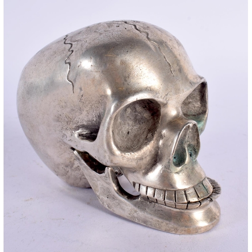 595 - A CONTEMPORARY SILVER PLATED SKULL INKWELL. 11 cm x 9 cm.