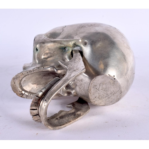 595 - A CONTEMPORARY SILVER PLATED SKULL INKWELL. 11 cm x 9 cm.