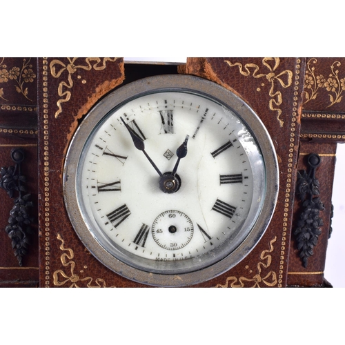 609 - AN ANTIQUE LEATHER CASED COUNTRY HOUSE CLOCK. 30 cm x 10 cm.