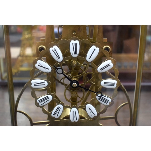 665 - A LARGE CONTEMPORARY BIG WHEEL SKELETON CLOCK. 52 cm x 28 cm.