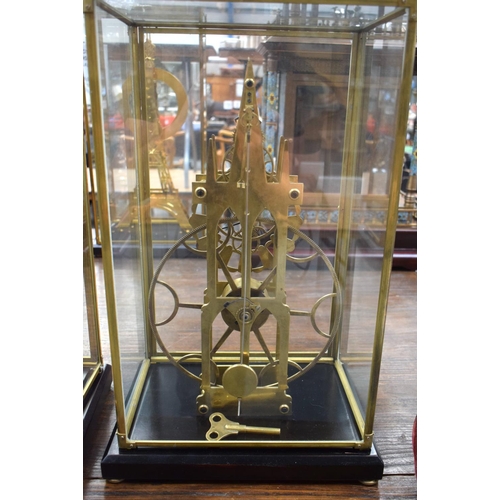 665 - A LARGE CONTEMPORARY BIG WHEEL SKELETON CLOCK. 52 cm x 28 cm.