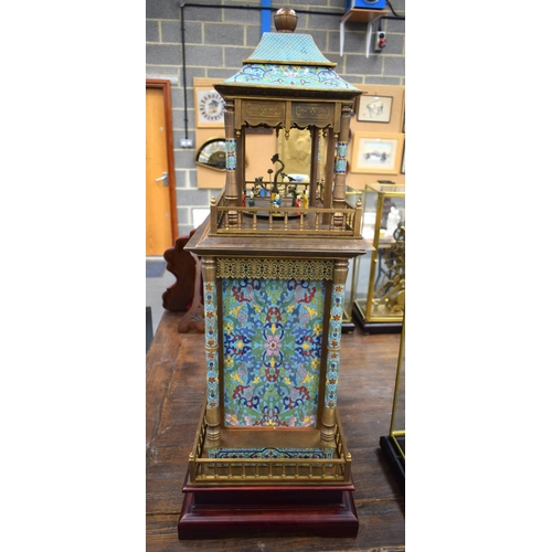 667 - A LARGE CONTEMPORARY CLOSIONNE ENAMEL AND BRONZE AUTOMATON CLOCK. 90 cm x 40 cm.