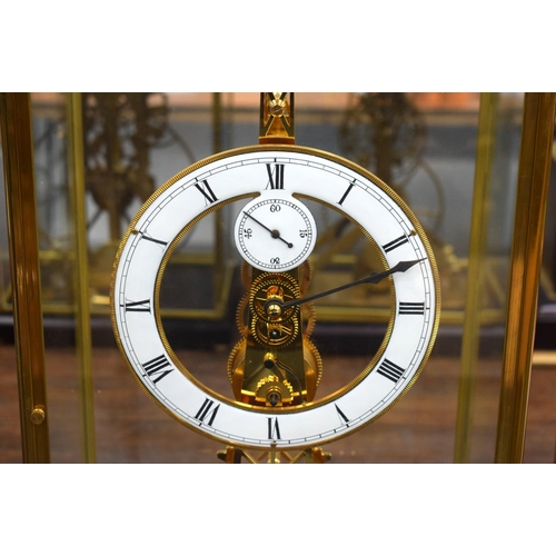 668 - A LARGE CONTEMPORARY EIFFEL TOWER SKELETON CLOCK. 65 cm x 25 cm.