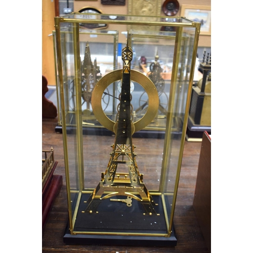 668 - A LARGE CONTEMPORARY EIFFEL TOWER SKELETON CLOCK. 65 cm x 25 cm.