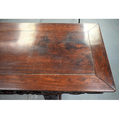 673 - A LARGE 19TH CENTURY CHINESE CARVED HARDWOOD ALTAR TABLE Qing. 210 cm x 105 cm x 48 cm.