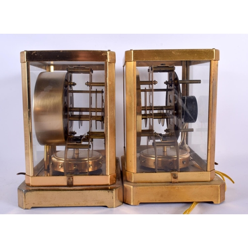 674 - TWO AMERICAN ATMOS CLOCKS. 24 cm x 15 cm. (2)