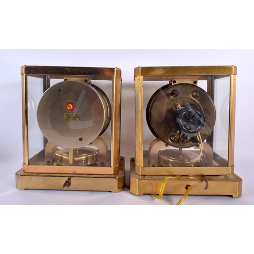 674 - TWO AMERICAN ATMOS CLOCKS. 24 cm x 15 cm. (2)