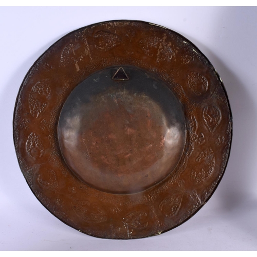 678 - AN ARTS AND CRAFTS COPPER DISH together with a large standing fire side figure. Largest 50 cm high. ... 