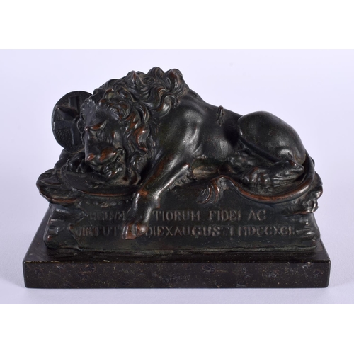 680D - A 19TH CENTURY EUROPEAN GRAND TOUR BRONZE FIGURE OF A LION with central inscription. 12 cm x 9 cm.