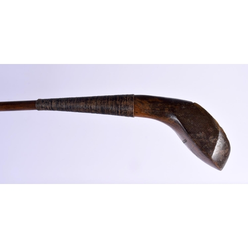 690 - A LATE 19TH CENTURY JAMES HUTCHISON OF NORTH BERWICK GOLF CLUB with scared neck and hickory shaft. 1... 