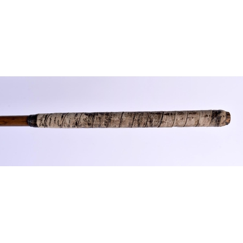 690 - A LATE 19TH CENTURY JAMES HUTCHISON OF NORTH BERWICK GOLF CLUB with scared neck and hickory shaft. 1... 