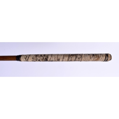 690 - A LATE 19TH CENTURY JAMES HUTCHISON OF NORTH BERWICK GOLF CLUB with scared neck and hickory shaft. 1... 