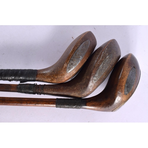 692 - THREE HICKORY SHAFTED DRIVING WOOD GOLF CLUBS including Forgan, George Tully & another. 108 cm long.... 