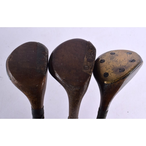 692 - THREE HICKORY SHAFTED DRIVING WOOD GOLF CLUBS including Forgan, George Tully & another. 108 cm long.... 