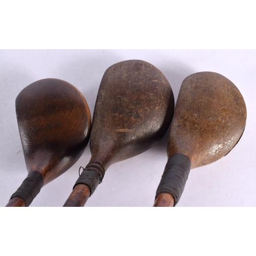 692 - THREE HICKORY SHAFTED DRIVING WOOD GOLF CLUBS including Forgan, George Tully & another. 108 cm long.... 