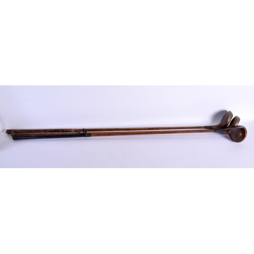 692 - THREE HICKORY SHAFTED DRIVING WOOD GOLF CLUBS including Forgan, George Tully & another. 108 cm long.... 