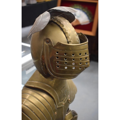 697 - AN UNUSUAL EARLY 20TH CENTURY EUROPEAN BRASS CHILD SIZE SUIT OF ARMOUR. 125 cm high.