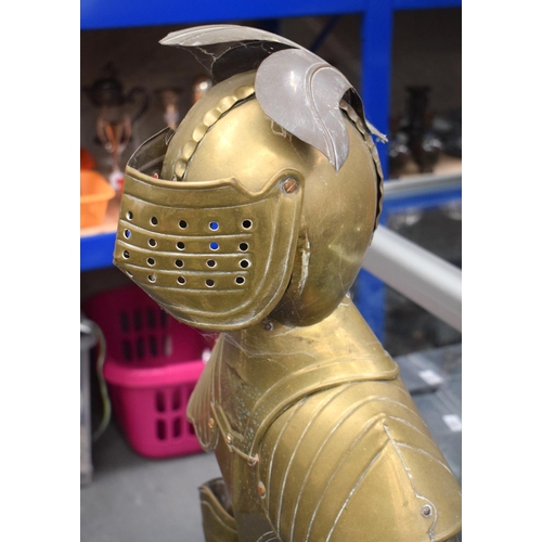 697 - AN UNUSUAL EARLY 20TH CENTURY EUROPEAN BRASS CHILD SIZE SUIT OF ARMOUR. 125 cm high.