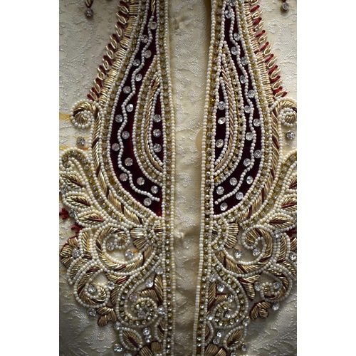 700A - A CHARMING INDIAN TURKISH SEED PEARL JEWELLED EMBROIDERED SILK JACKET. 115 cm x 136 cm.