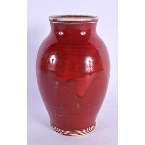 701 - A CHARMING EUROPEAN CHINESE STYLE FLAMBE GLAZED VASE. 15 cm high.