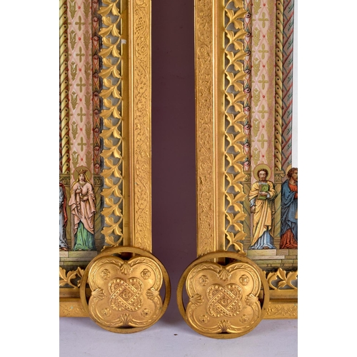 702 - A PAIR OF 19TH CENTURY GOTHIC REVIVAL GILT BRONZE FRAMES inset with Religious panels. 38 cm x 24 cm.