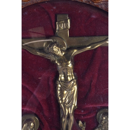 704 - AN ANTIQUE BLACK FOREST CASED BRONZE CRUCIFIX. 48 cm x 38 cm.