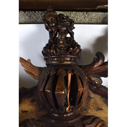 705D - A LARGE ANTIQUE COUNTRY HOUSE ARMORIAL CARVED WOOD COAT OF ARMS. 80 cm x 75 cm.