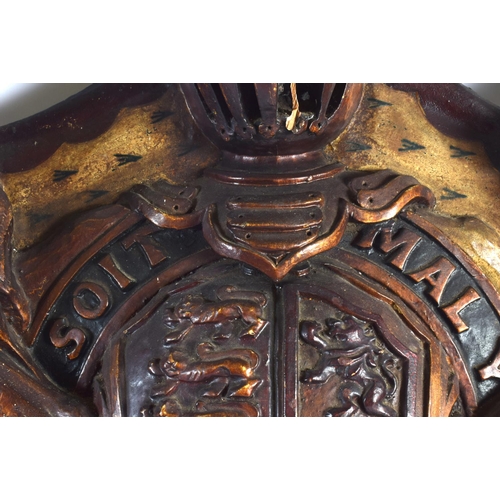 705D - A LARGE ANTIQUE COUNTRY HOUSE ARMORIAL CARVED WOOD COAT OF ARMS. 80 cm x 75 cm.