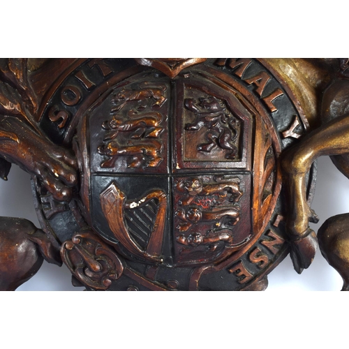 705D - A LARGE ANTIQUE COUNTRY HOUSE ARMORIAL CARVED WOOD COAT OF ARMS. 80 cm x 75 cm.