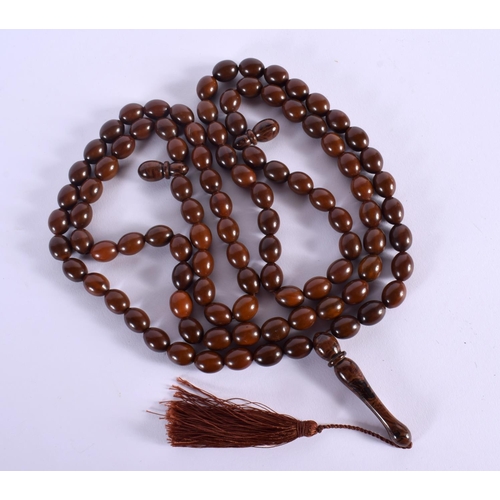 705B - A STRING OF MIDDLE EASTERN ISLAMIC RELIGIOUS BEADS. 160 cm long.