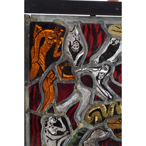 707 - A RARE STAINED GLASS WINDOW in the manner of Marc Chagall, depicting demonic figures in various purs... 