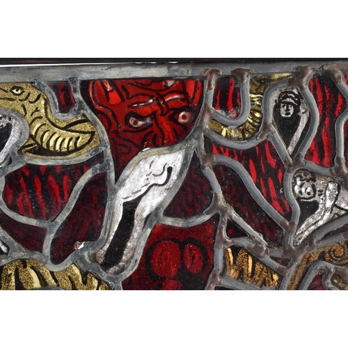 707 - A RARE STAINED GLASS WINDOW in the manner of Marc Chagall, depicting demonic figures in various purs... 