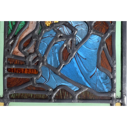 708 - AN UNUSUAL STAINED GLASS WINDOW depicting figures in erotic pursuits. 26 cm x 18 cm.