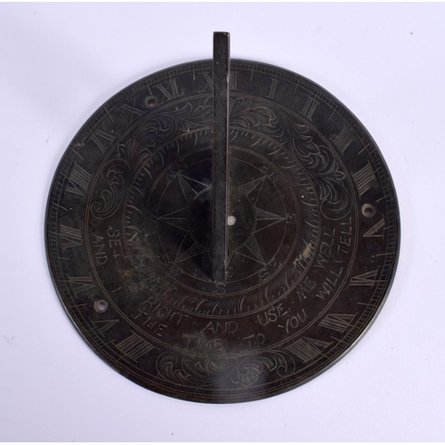 715A - A BRONZE SUNDIAL. 15 cm diameter.