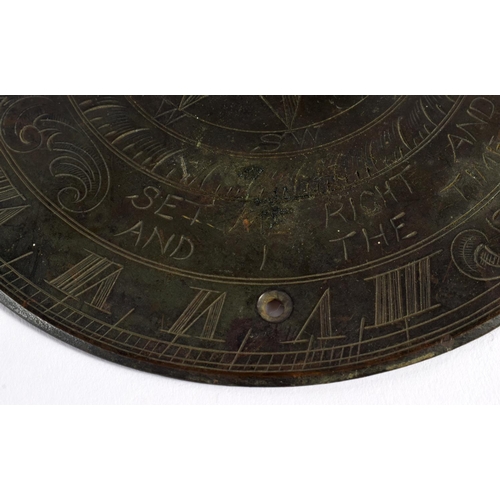 715A - A BRONZE SUNDIAL. 15 cm diameter.