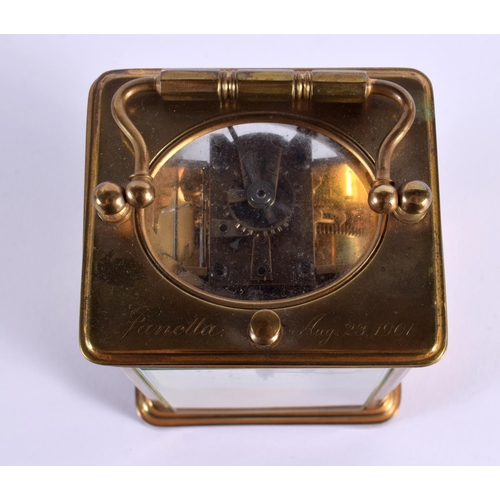 715C - A FRENCH REPEATING BRASS CARRIAGE CLOCK. 16 cm high inc handle.