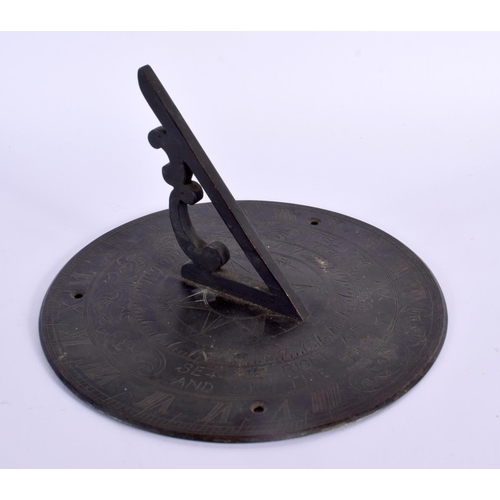 715A - A BRONZE SUNDIAL. 15 cm diameter.