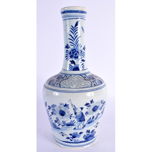 72 - A DELFT BLUE AND WHITE VASE. 26 cm high.