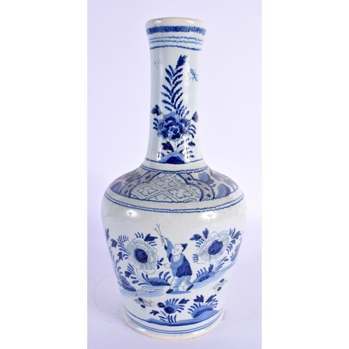 72 - A DELFT BLUE AND WHITE VASE. 26 cm high.