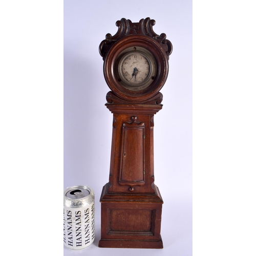 720E - AN ANTIQUE MINIATURE GRANDFATHER CLOCK. 43 cm high.