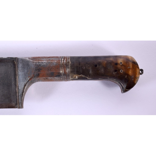 721B - A 19TH CENTURY MIDDLE EASTERN CARVED RHINOCEROS HORN SWORD. 77 cm long.