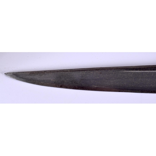 721B - A 19TH CENTURY MIDDLE EASTERN CARVED RHINOCEROS HORN SWORD. 77 cm long.