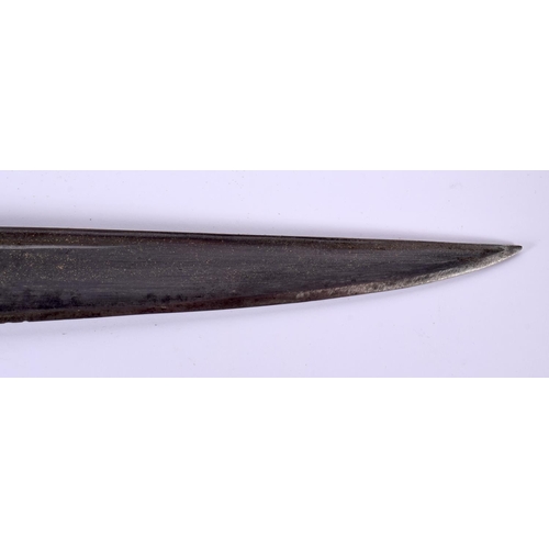 721B - A 19TH CENTURY MIDDLE EASTERN CARVED RHINOCEROS HORN SWORD. 77 cm long.