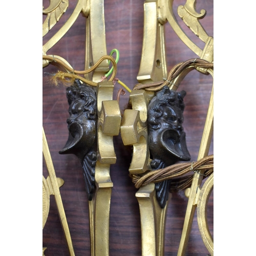 723H - FOUR COUNTRY HOUSE BRONZE WALL SCONCES. 37 cm x 18 cm. (4)