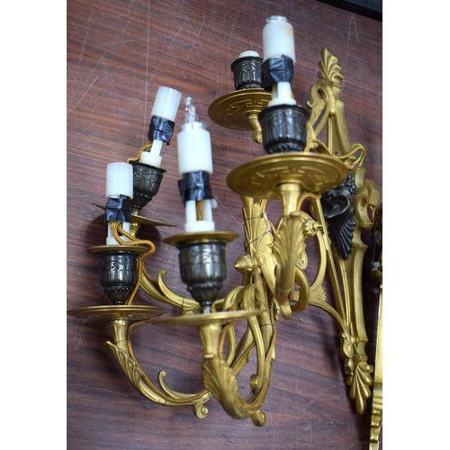 723H - FOUR COUNTRY HOUSE BRONZE WALL SCONCES. 37 cm x 18 cm. (4)